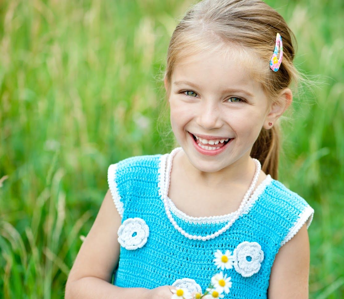 smiling girl with beautiful healthy teeth