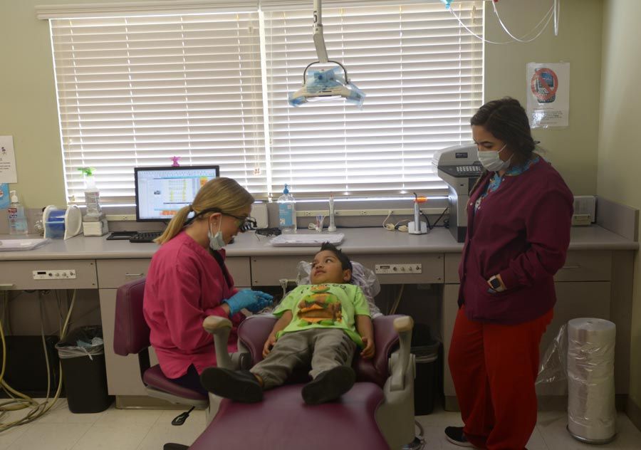 child in dental chair