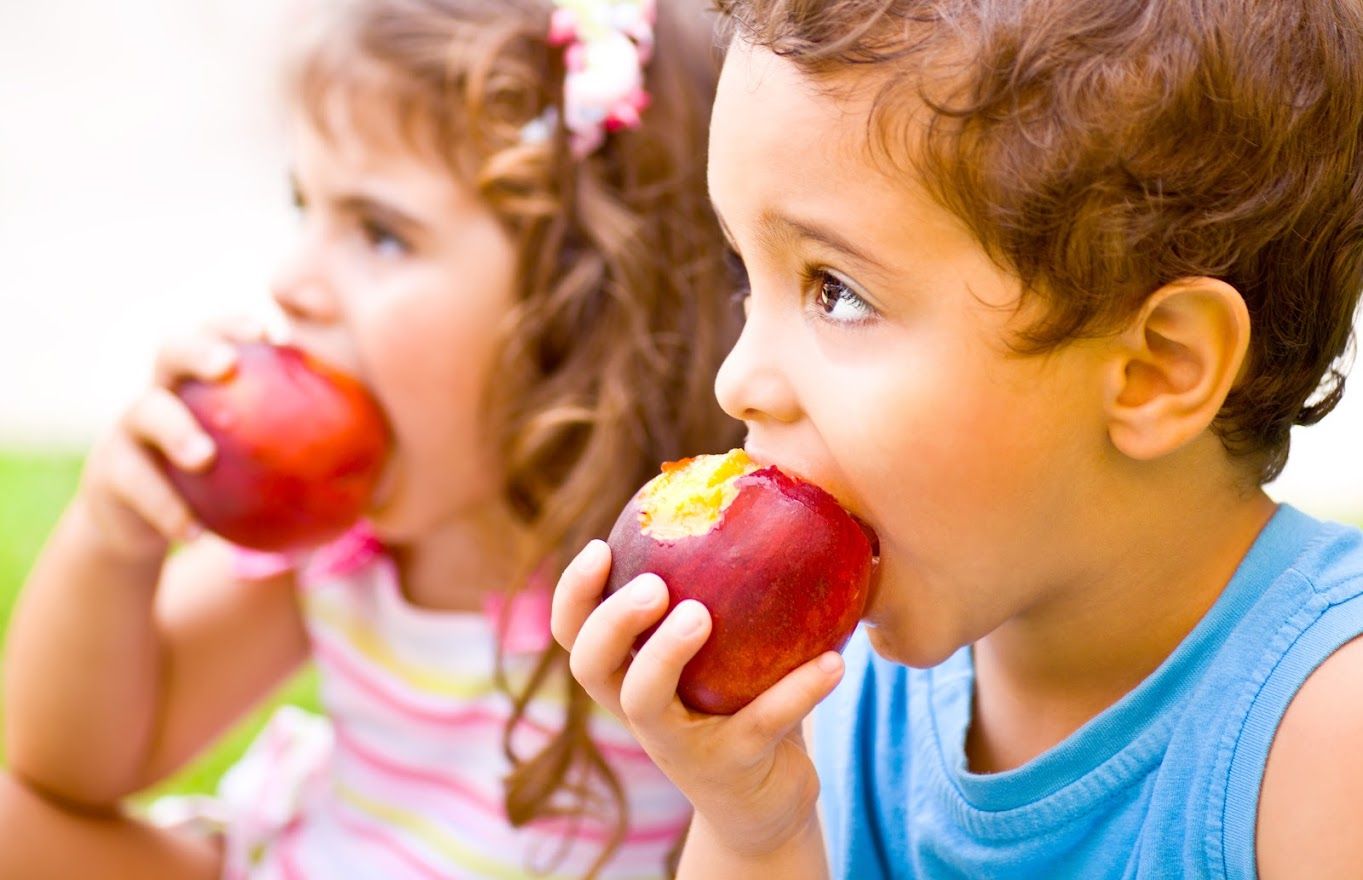 two kids eating